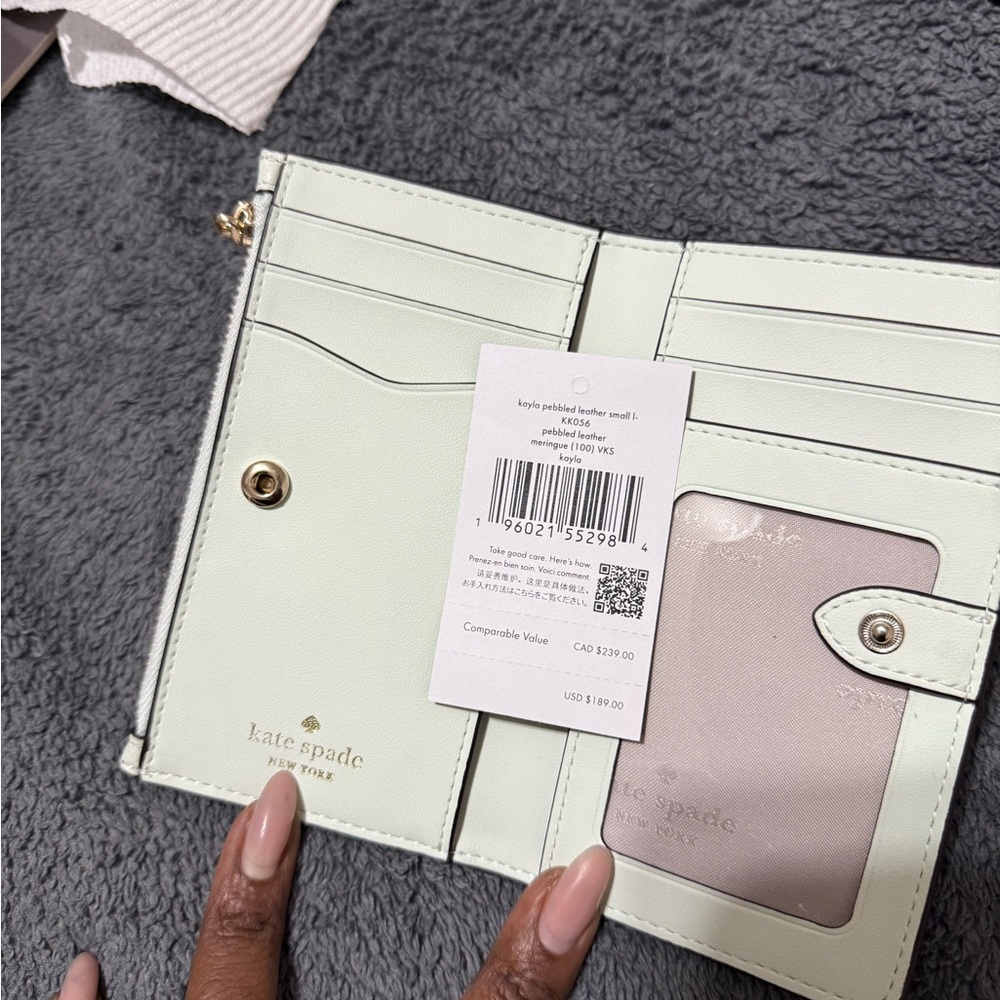 Kate Spade Light Green Wallet with Gold Accents